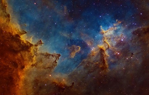 Situated 7500 light years away in the ‘W’-shaped constellation of Cassiopeia, the Heart Nebula is a vast region of glowing gas, energized by a cluster of young stars at its center. The image depicts the central region, where dust clouds are being eroded and molded into rugged shapes by the searing cosmic radiation.
